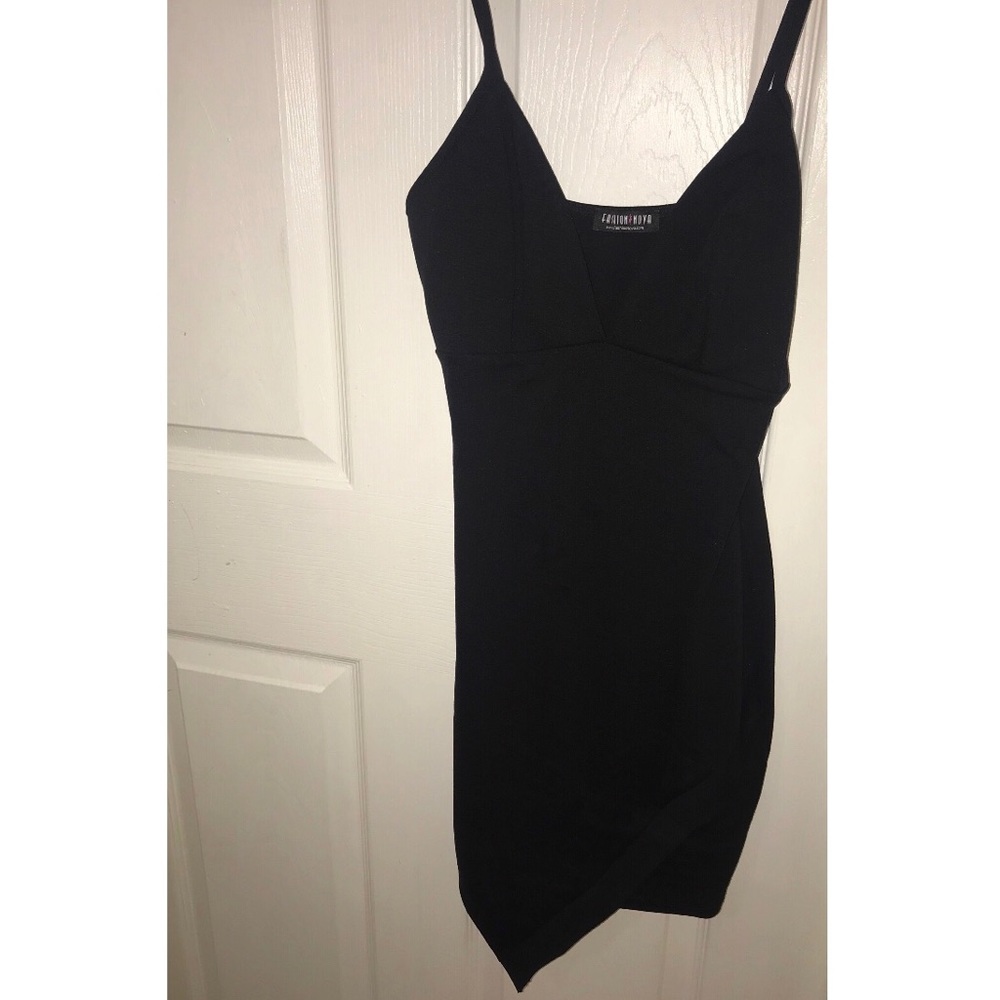 Mini black dress with crop design.